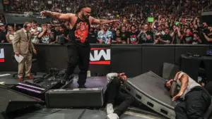 Roman Reigns Leaves WWE RAW With Possible Arm Injury