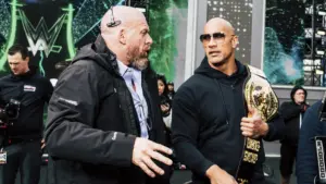 Reported Reason For Triple H And The Rock’s Tension Revealed