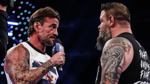 The Full Story Behind CM Punk and Kevin Owens’ Real-Life Backstage Incident From 20 Years Ago